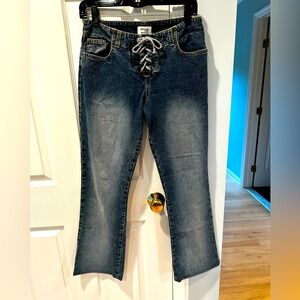 New condition vintage lace up Denim jeans.
